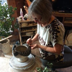 Ria Nickerson working on her pottery