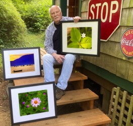 Dal Neitzel with some of his photographs